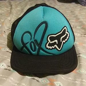 Blue and black Fox motorsports snapback hat.